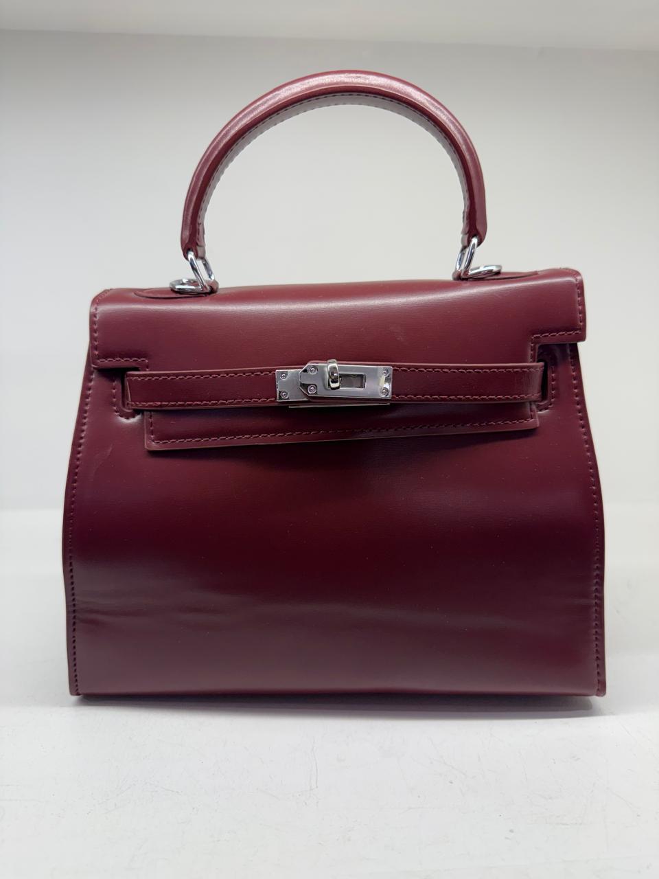 Cartera Hermes bordo