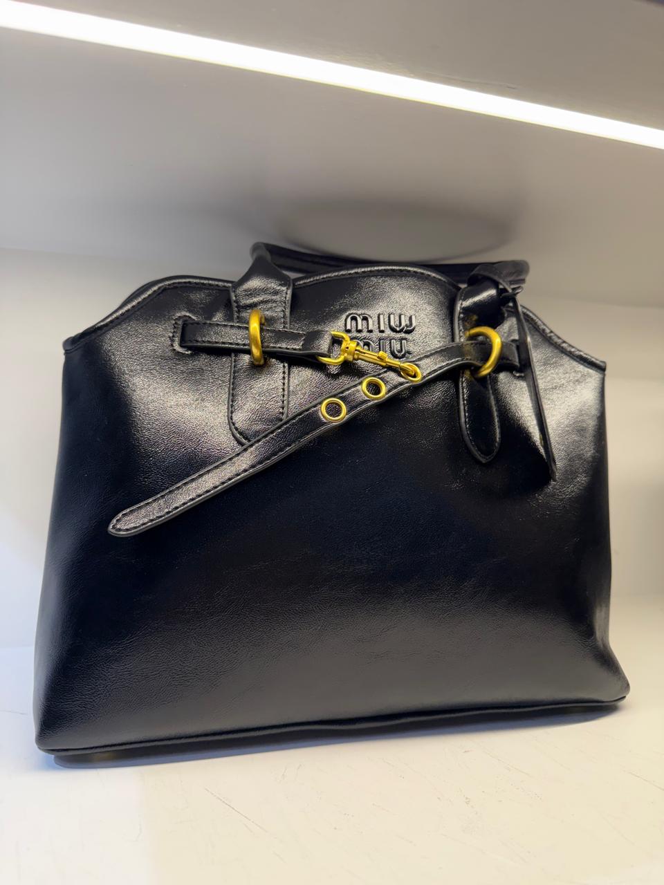 Cartera miu miu