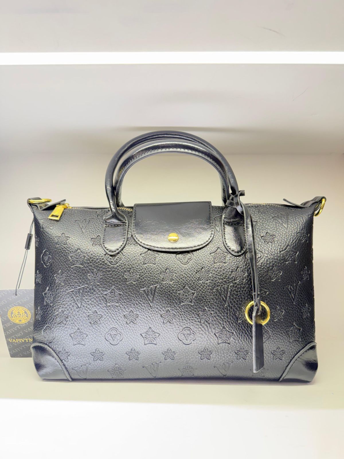 Cartera Lonyam Negra